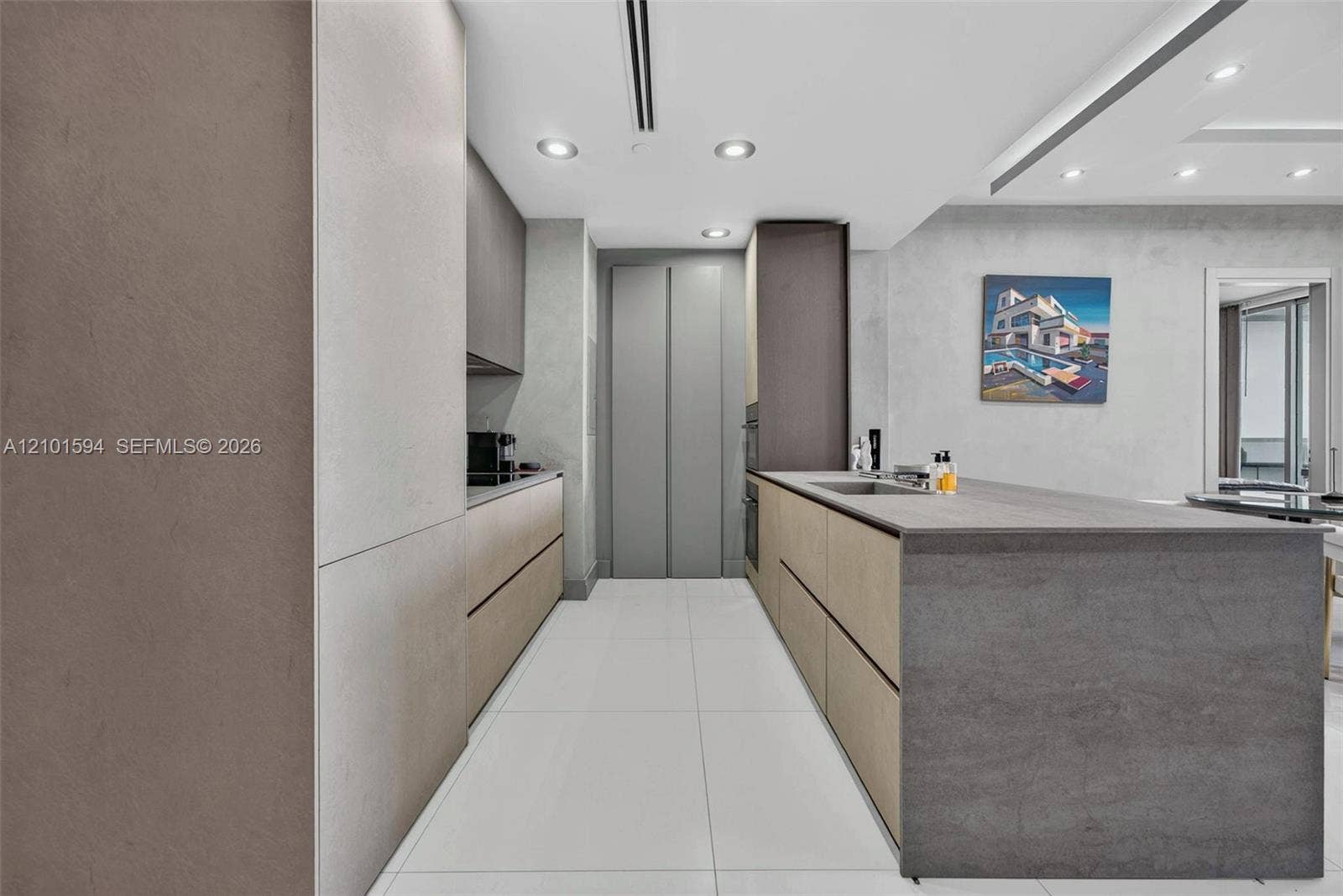 Modulnova kitchen with large island and abundant cabinetry.