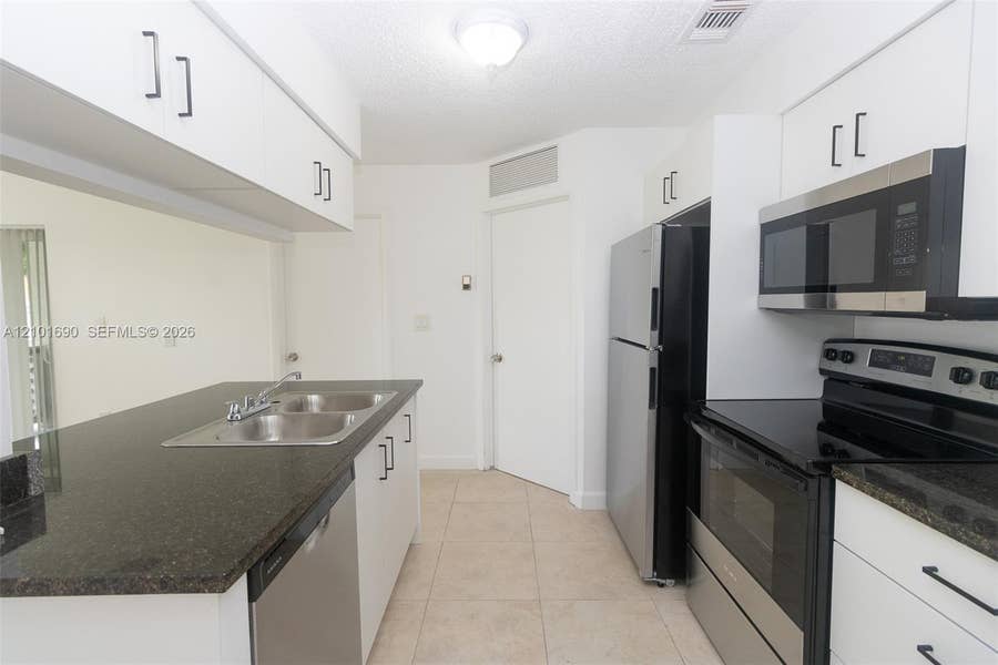Property photo for 17520 NW 67th Place, #M-3, Hialeah, FL