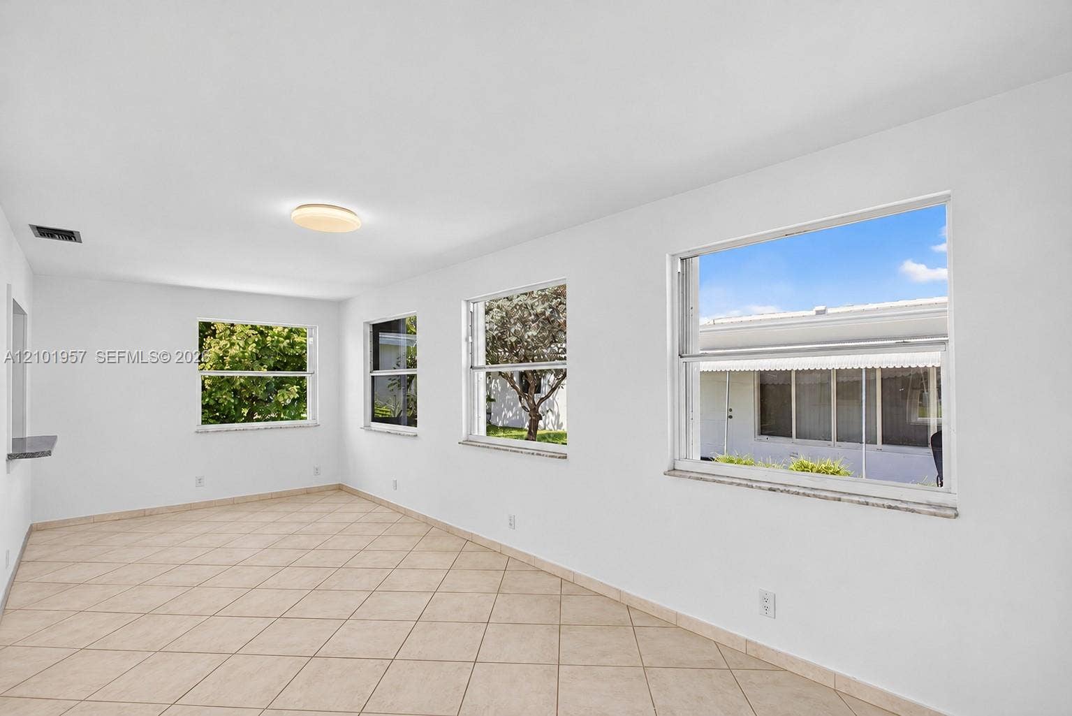 341 NW 25th Court, Pompano Beach, FL 33064 Window A/C Virtually Edited Out