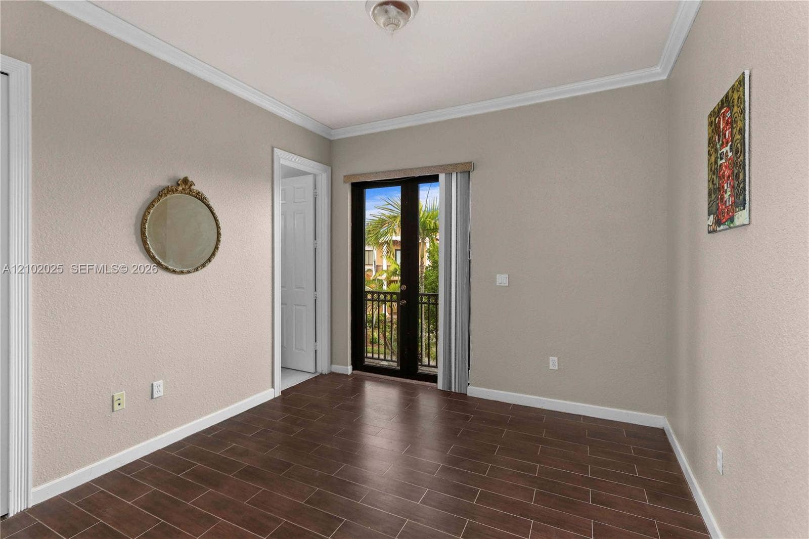 Front bedroom with balcony