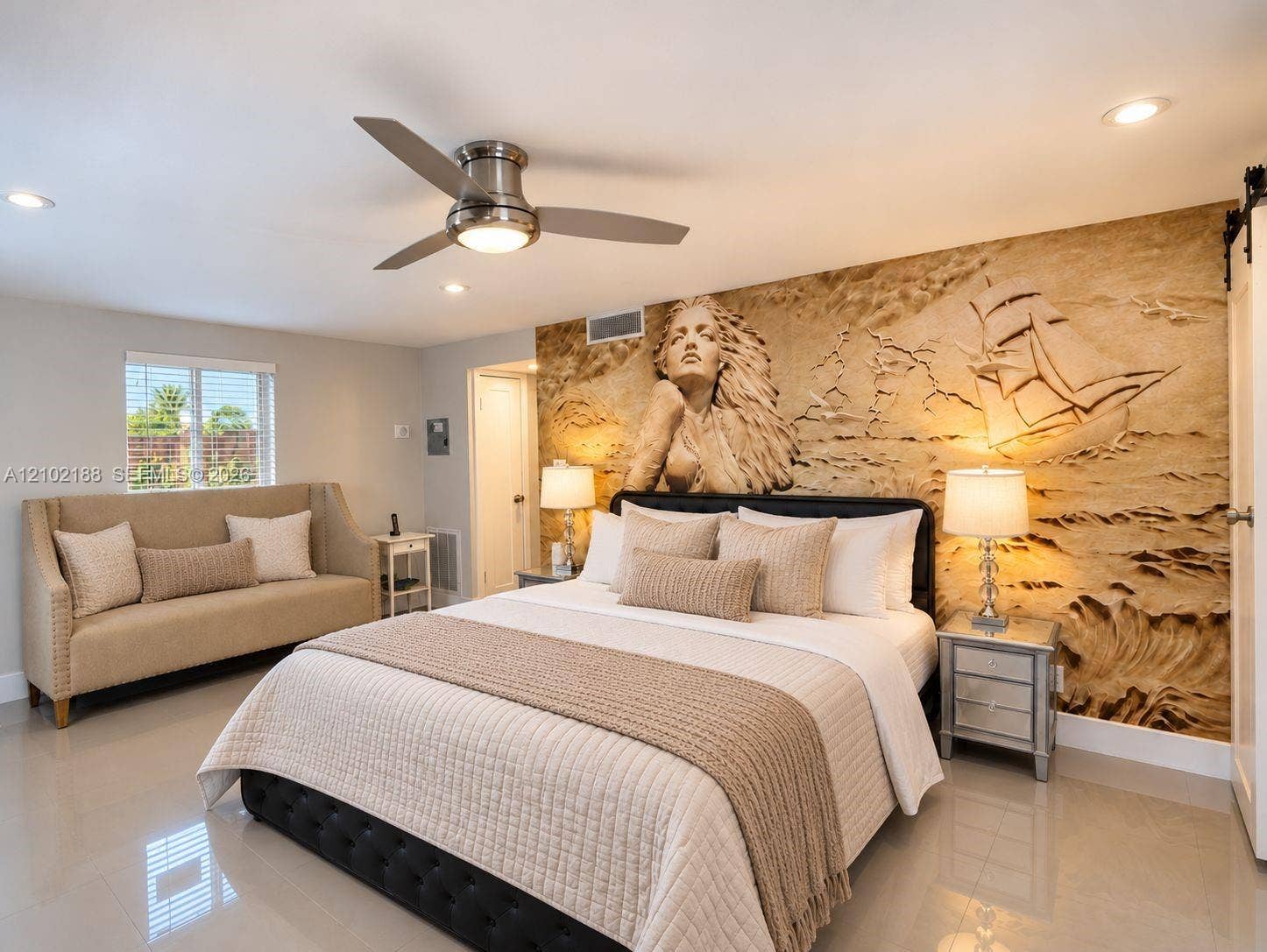 Room featuring a large-scale sculpted relief wall art, polished tile flooring, recessed lighting, and a brushed nickel ceiling fan