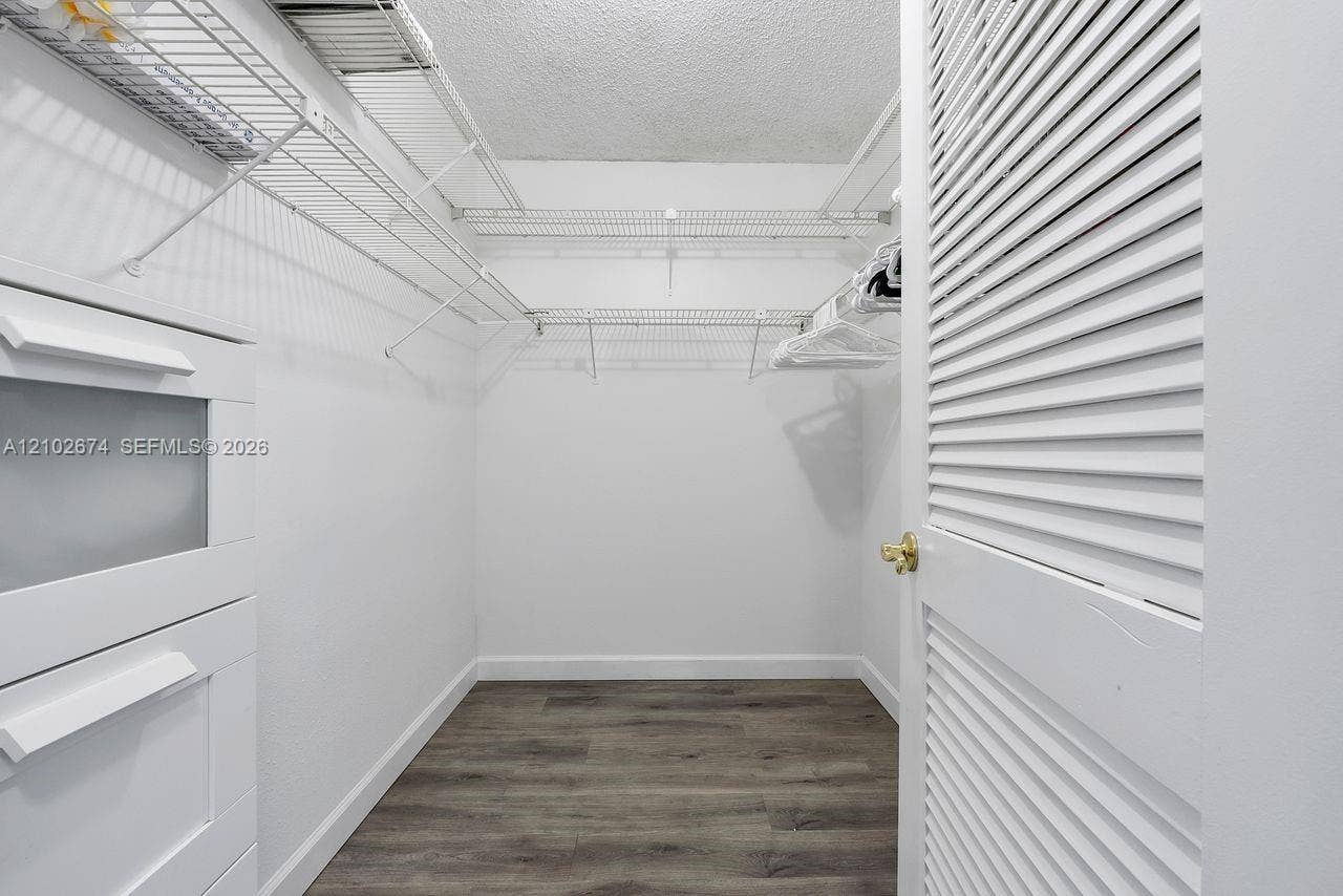 23249 N Barwood Lane N, #102, Boca Raton, FL 33428 Primary Bedroom Walk In Closet
