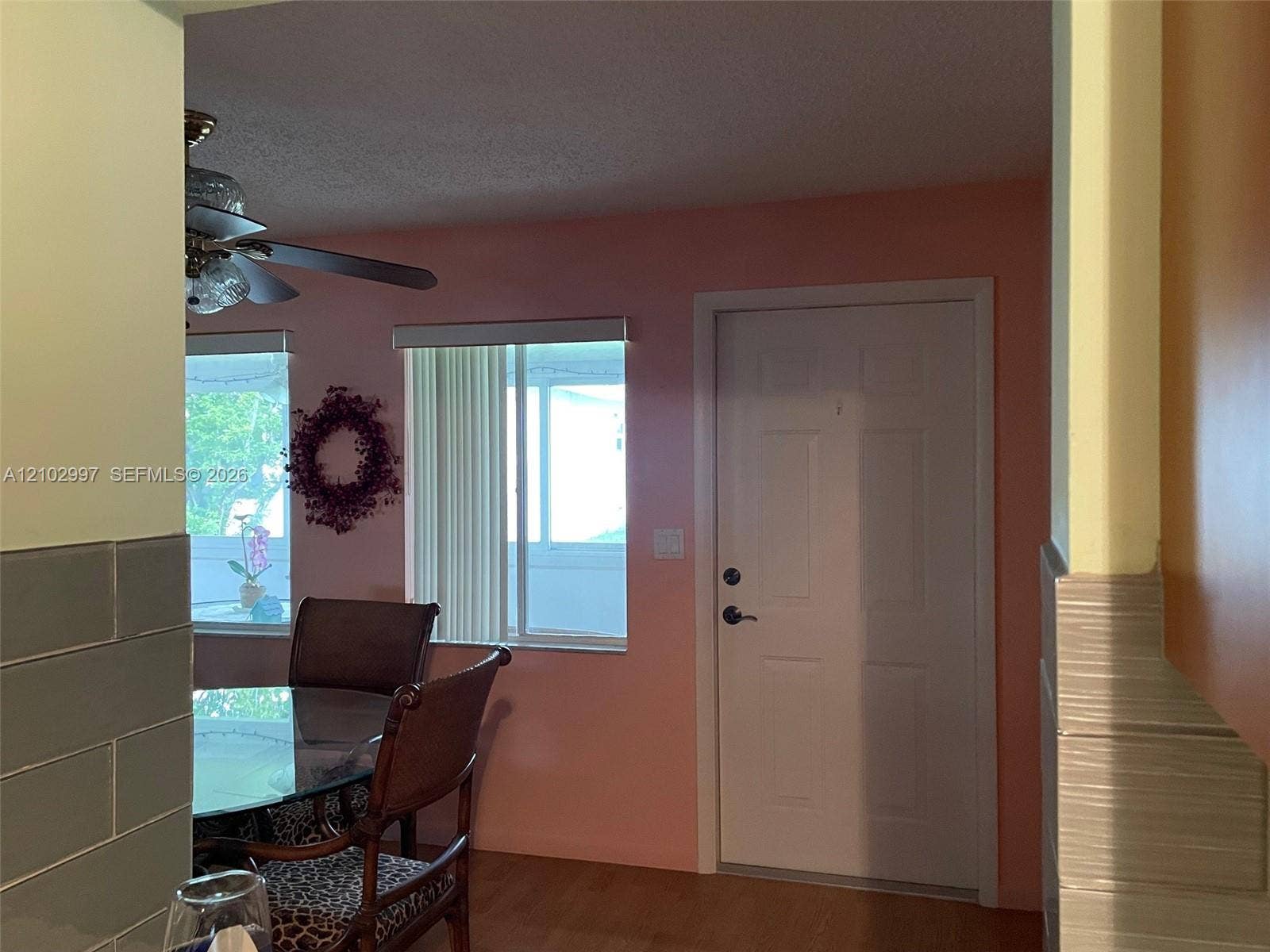BACK DOOR OPEING TO FLORIDA ROOM