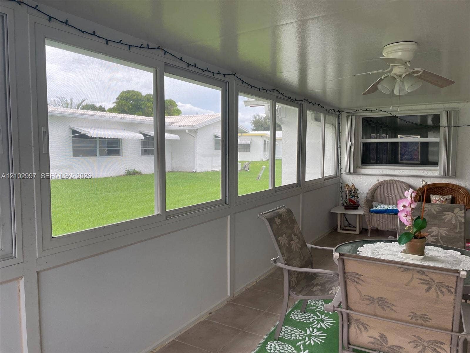 FLORIDA ROOM WITH TILE FLOORS