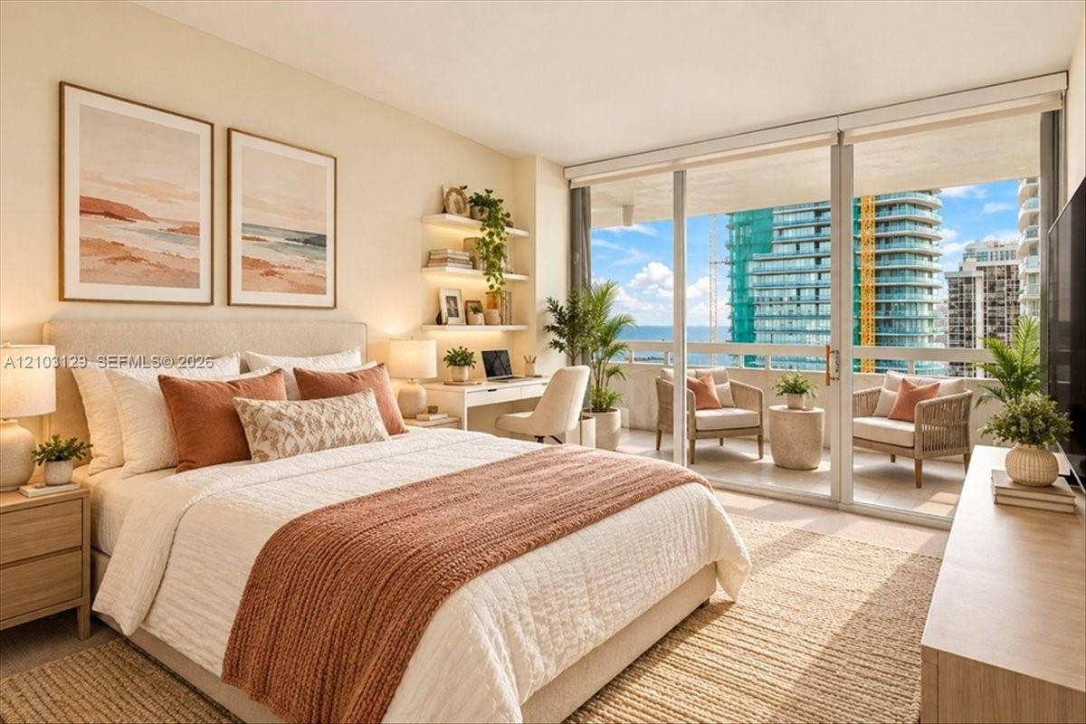 1627 Brickell Avenue, #2005, Miami, FL 33129 Floor-to-ceiling glass sliding doors, built-in shelving, and a private balcony