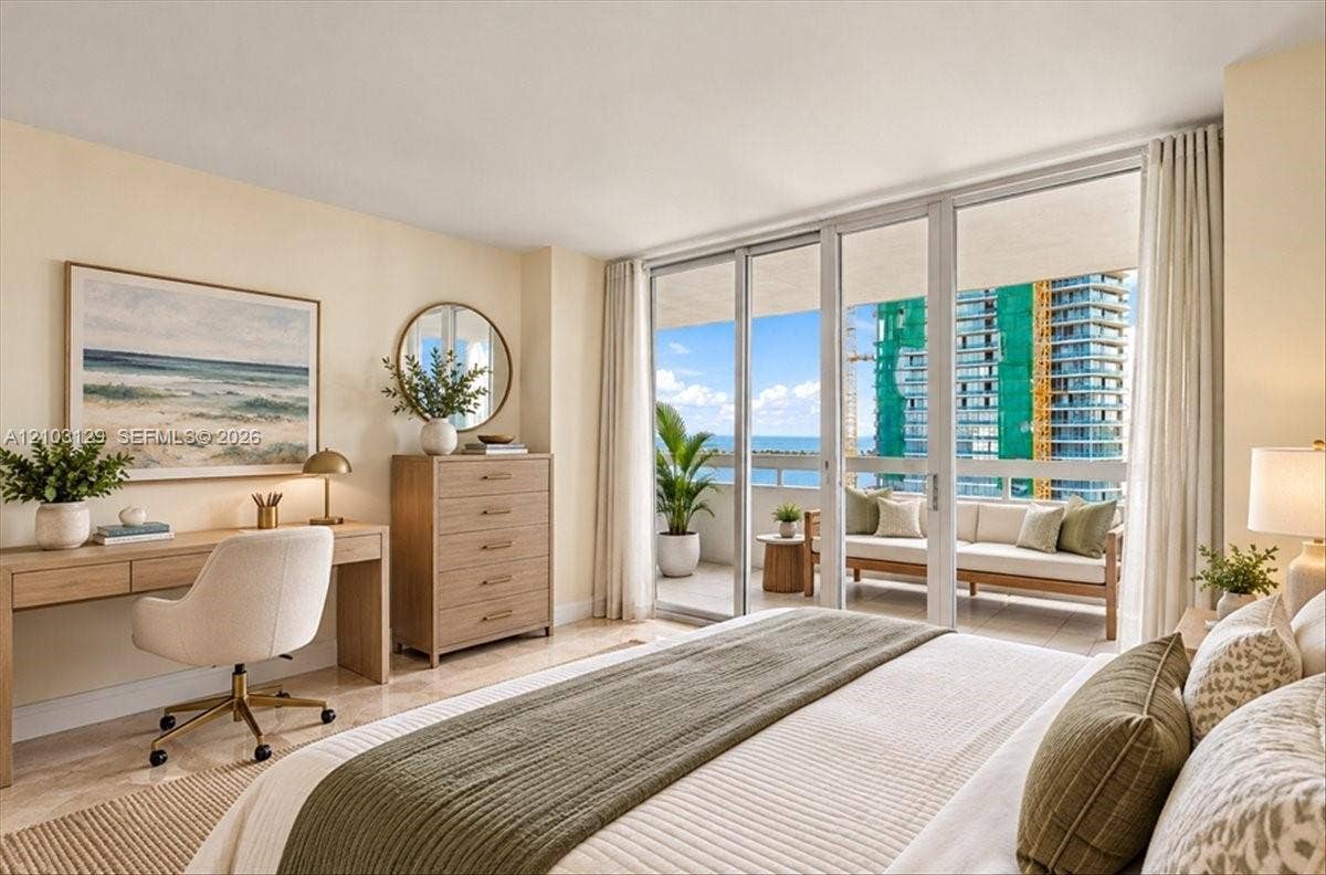 1627 Brickell Avenue, #2005, Miami, FL 33129 Floor-to-ceiling glass sliding doors, covered private balcony, light-toned stone flooring, neutral wall color palette