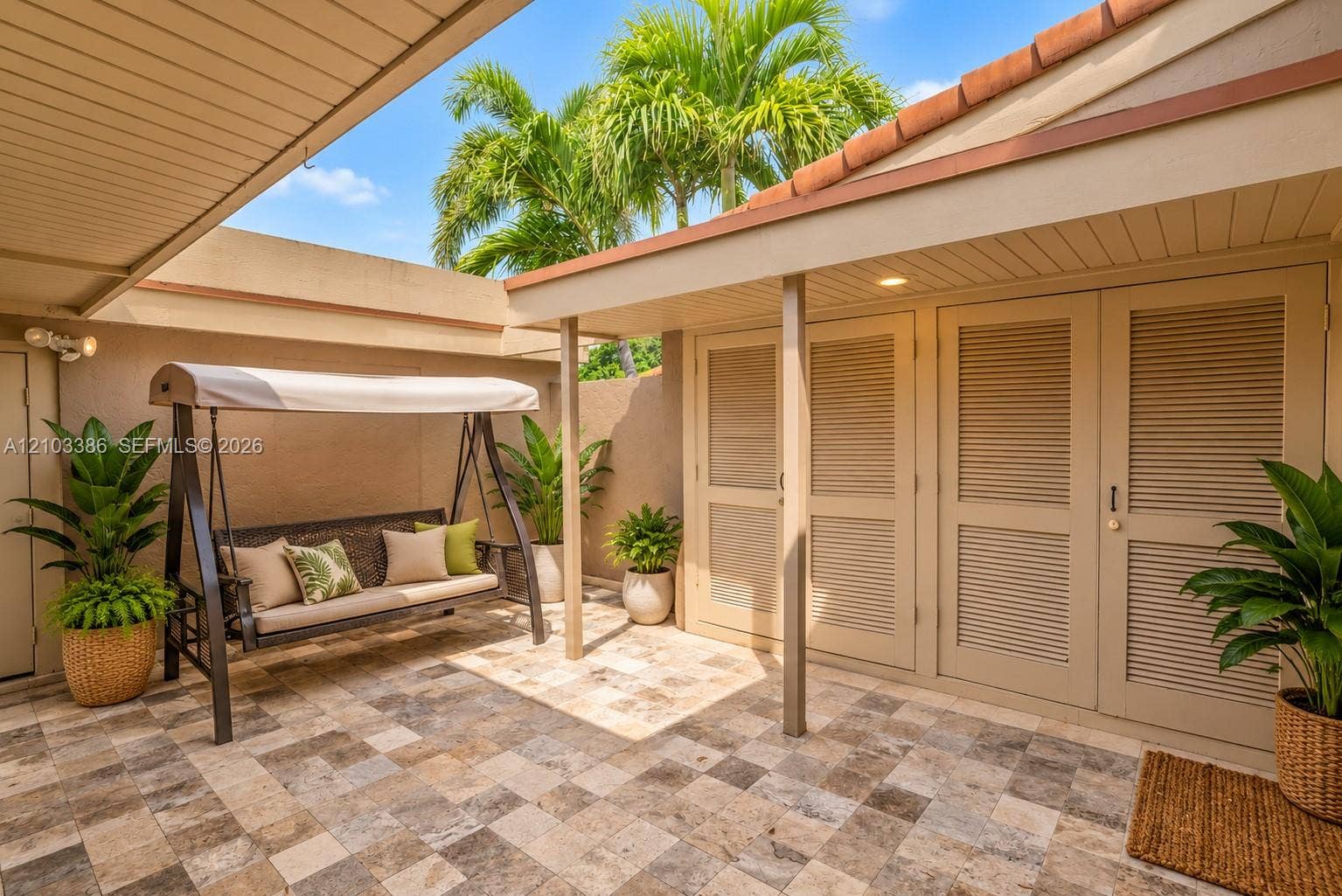 You enter into an inviting courtyard