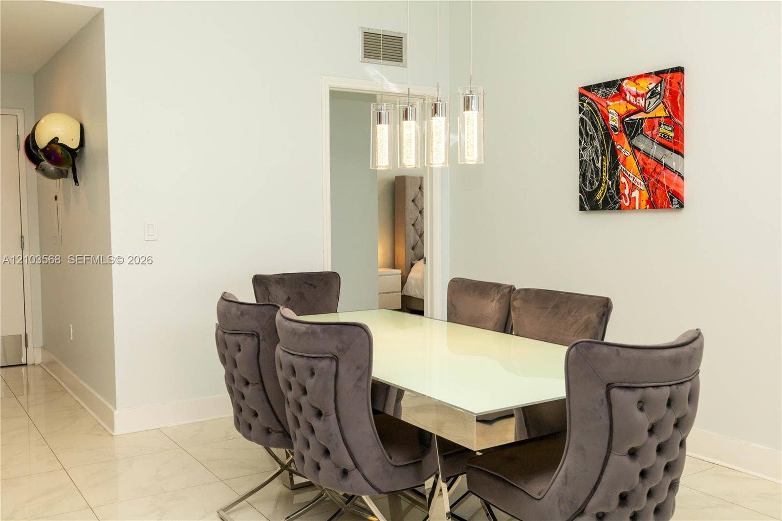 7901 Hispanola Avenue, #801, North Bay Village, FL 33141 Polished tile flooring and modern four-light pendant fixture with cylindrical glass shades