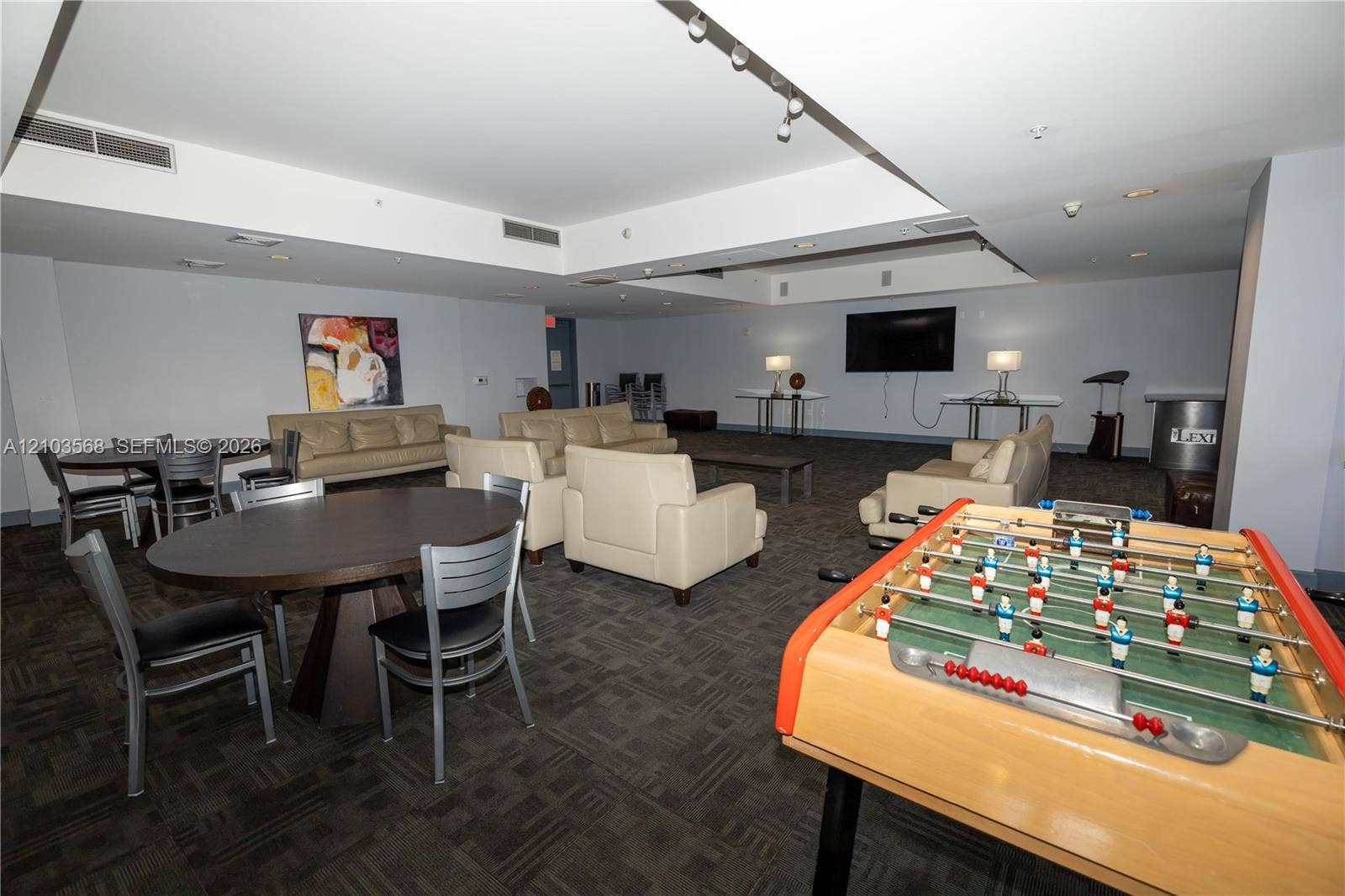 7901 Hispanola Avenue, #801, North Bay Village, FL 33141 Expansive common area featuring recessed ceiling lighting, a neutral color palette, and wall-to-wall carpeting