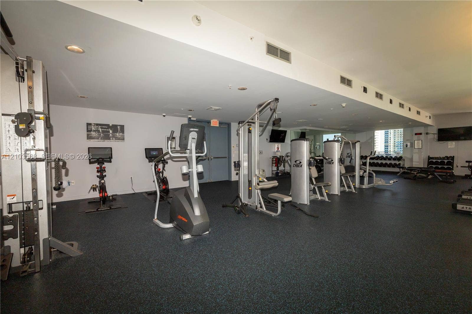 7901 Hispanola Avenue, #801, North Bay Village, FL 33141 Fitness center featuring industrial-grade exercise equipment, rubberized flooring, and recessed ceiling lighting