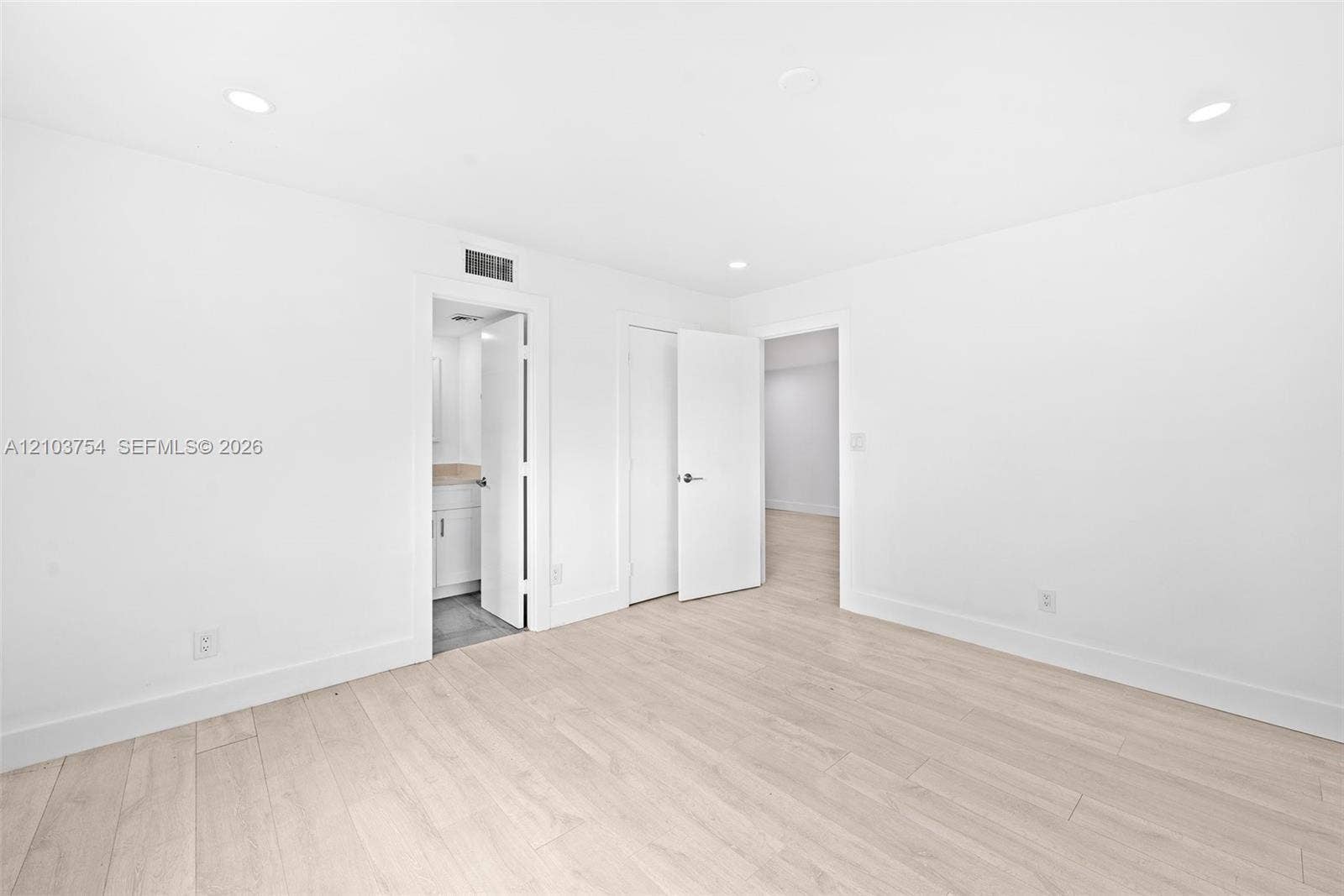 Master bedroom with walk-in closet