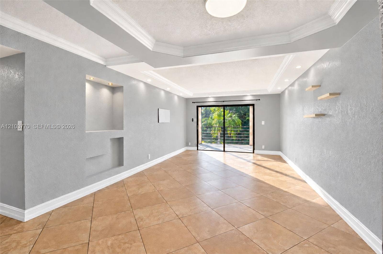 9440 SW 8th Street, #309, Boca Raton, Boca Raton, FL 33428 Recessed lighting, tile flooring, built-in wall niche with accent lighting, and crown molding