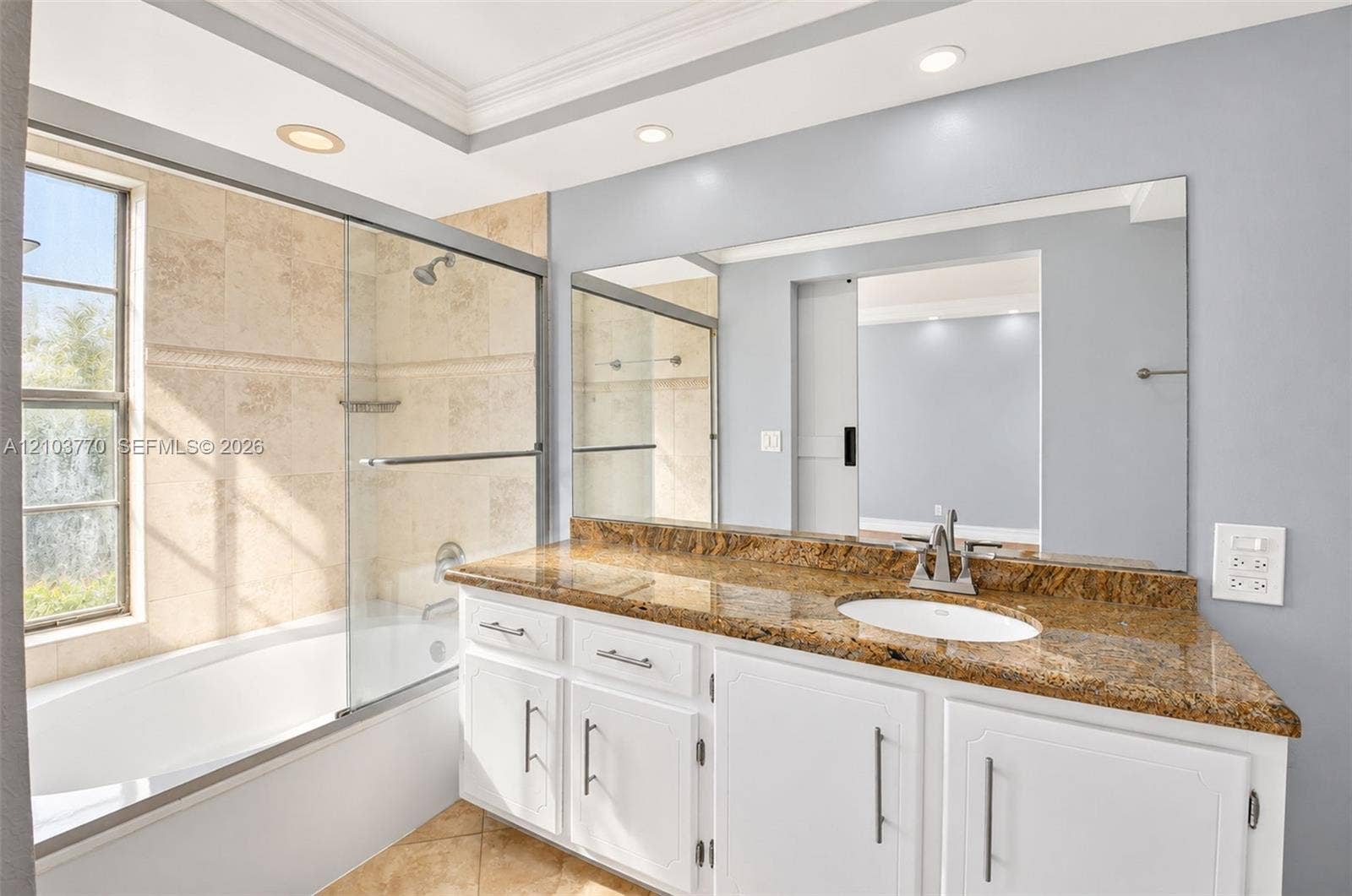 9440 SW 8th Street, #309, Boca Raton, Boca Raton, FL 33428 Bathroom featuring a large vanity with an undermount sink, a polished stone countertop, and white cabinetry with dark hardware