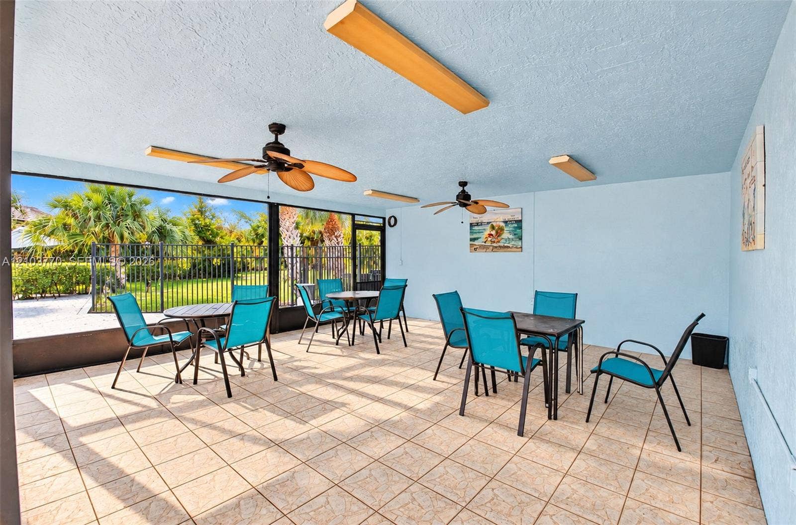 9440 SW 8th Street, #309, Boca Raton, Boca Raton, FL 33428 Screened enclosure with tile flooring and multiple ceiling fans