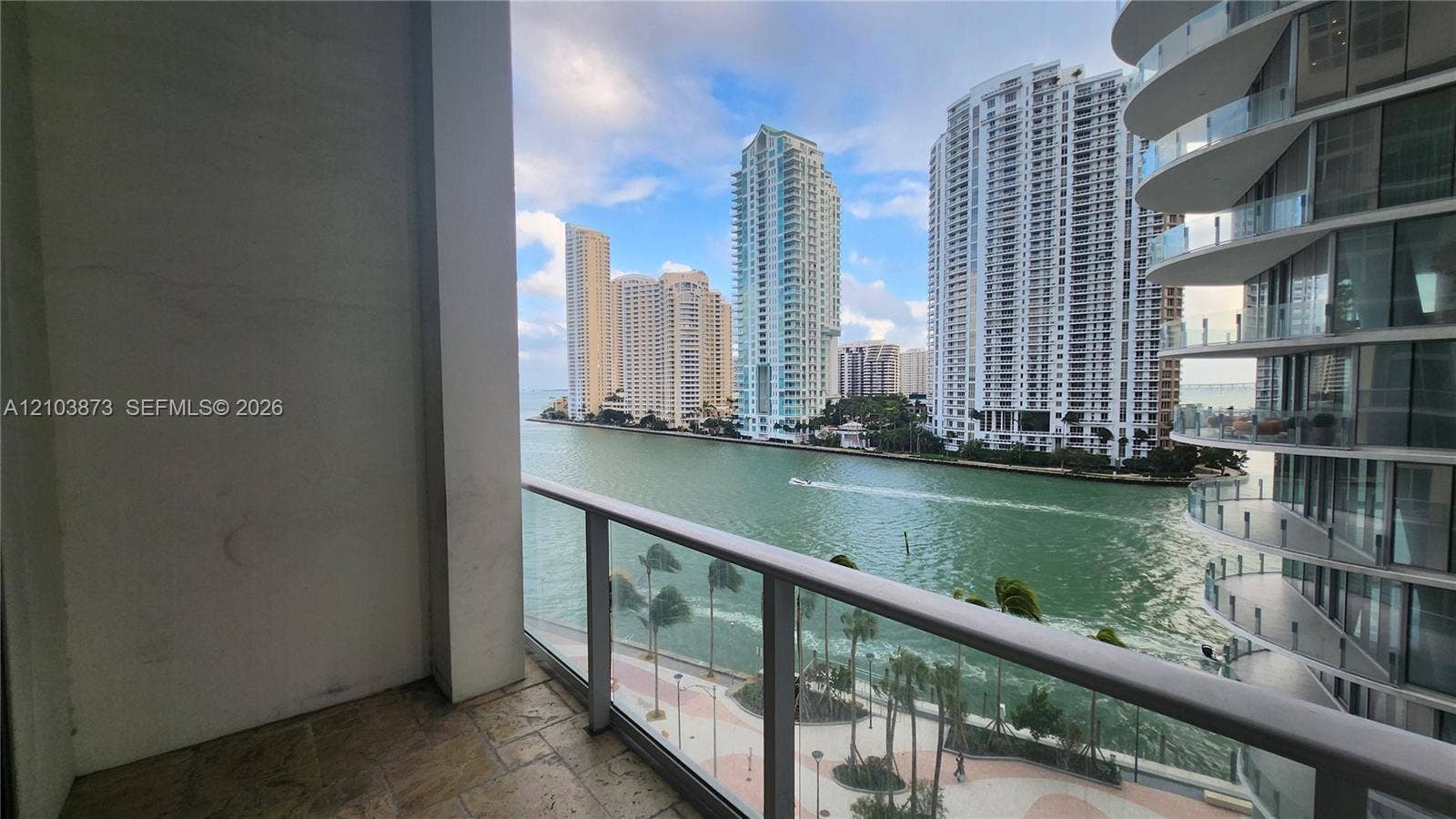 300 S Biscayne Boulevard, #L-808, Miami, FL 33131 Private balcony featuring stone tile flooring and a glass railing