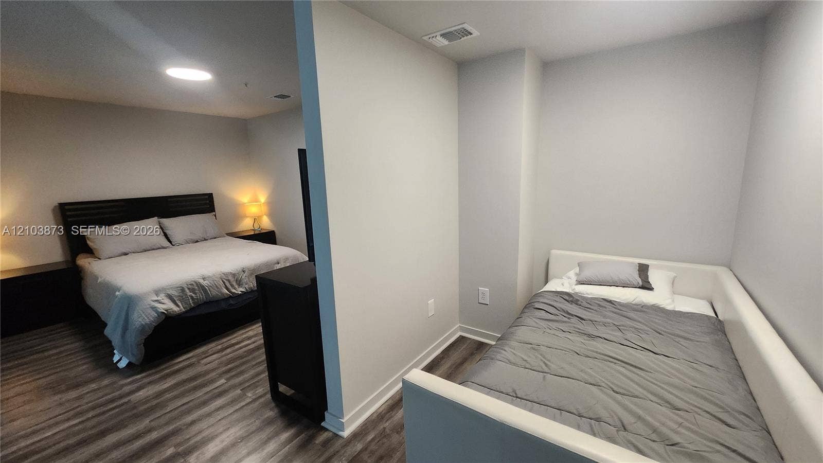 300 S Biscayne Boulevard, #L-808, Miami, FL 33131 Interior space featuring neutral wall paint and wood-finish flooring
