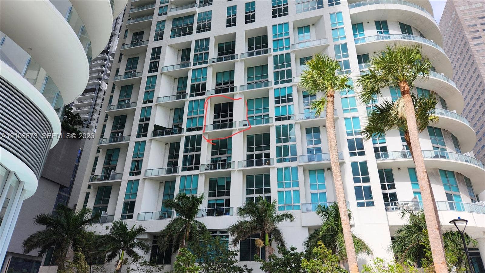 300 S Biscayne Boulevard, #L-808, Miami, FL 33131 High-rise exterior featuring floor-to-ceiling glass windows and private balconies with glass railings