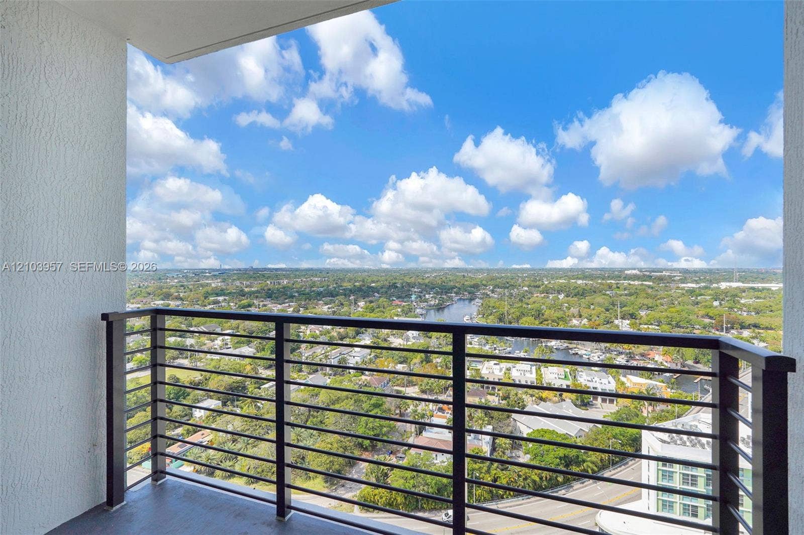 307 SW 5th Street, #0, Fort Lauderdale, Fort Lauderdale, FL 33315 Balcony featuring a metal railing and a high-rise perspective