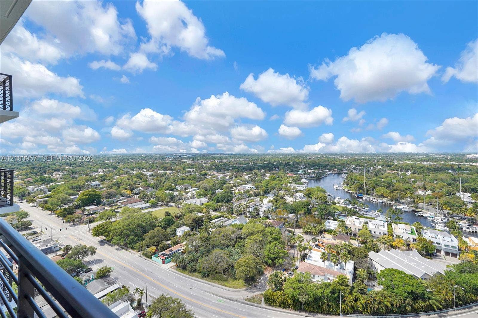 307 SW 5th Street, #0, Fort Lauderdale, Fort Lauderdale, FL 33315 Expansive city and waterway backdrop with established trees and residential structures