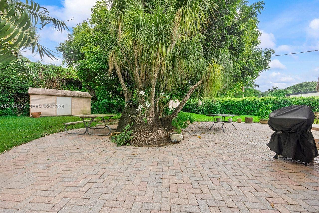 Backyard Patio & Storage Bldg