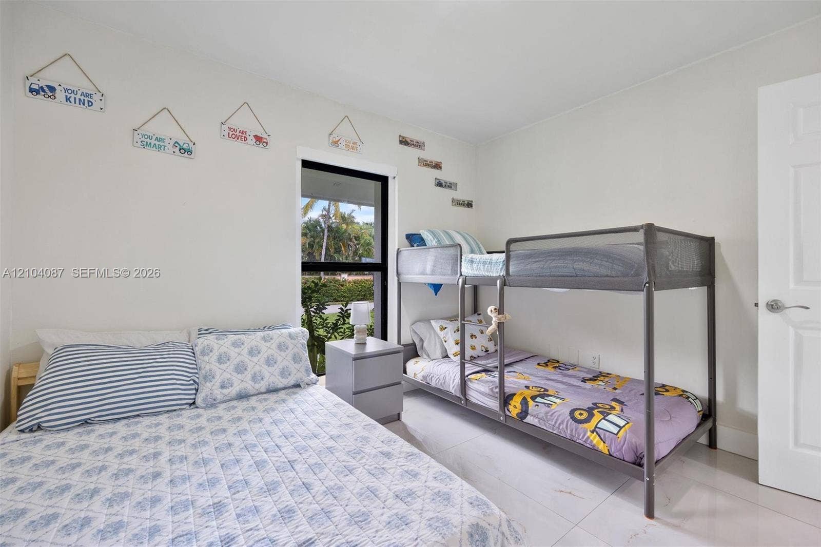 8840 SW 181st Terrace, Palmetto Bay, FL 33157 White walls with a single window featuring a dark frame