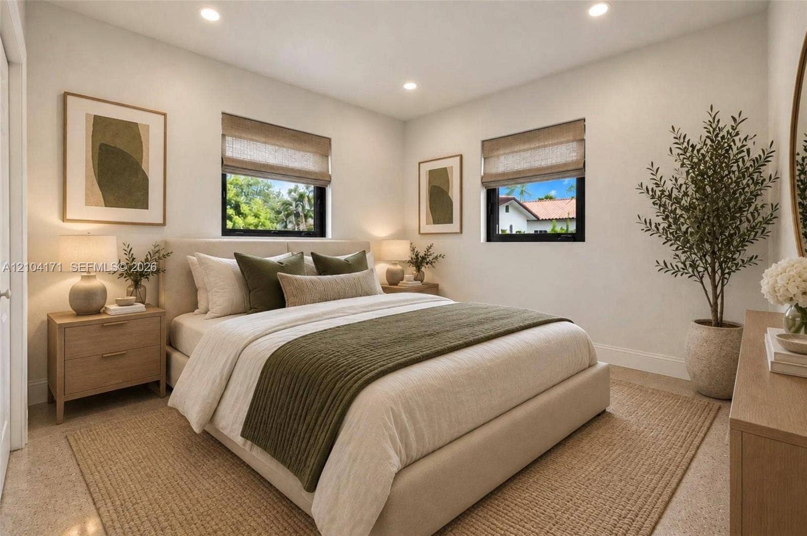 745 NW 32nd Avenue, Miami, FL 33125 Neutral-toned room featuring recessed lighting, dual windows with black frames, and light-toned hard-surface flooring