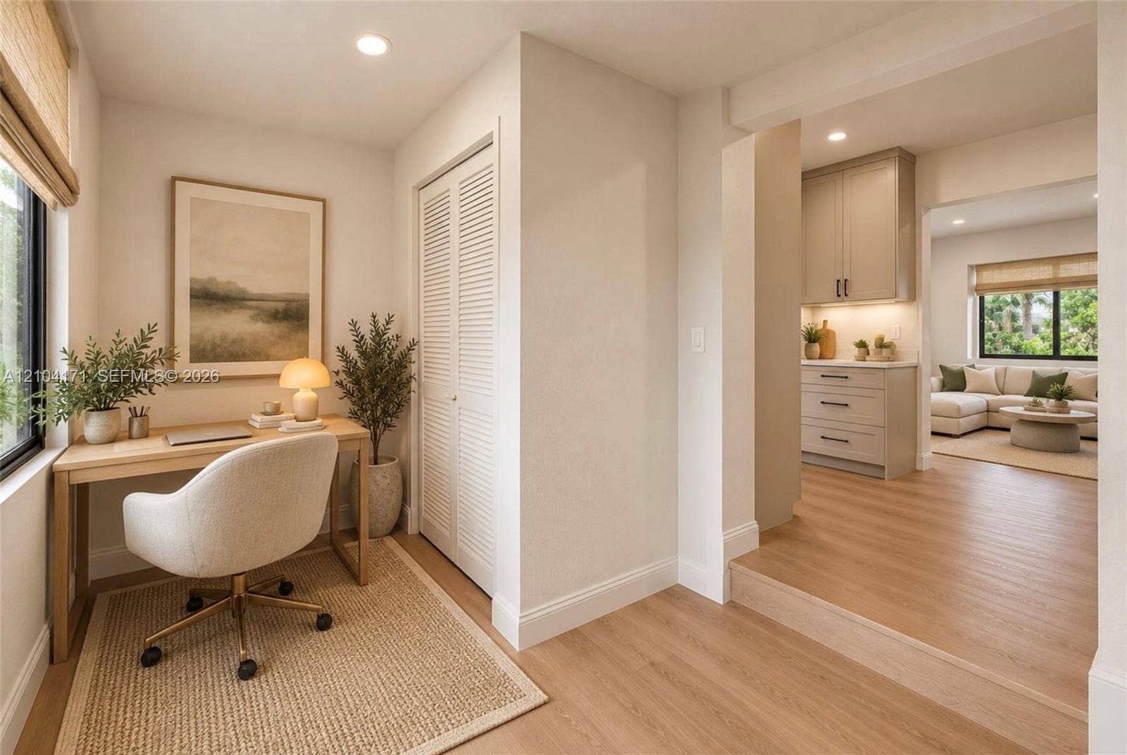 745 NW 32nd Avenue, Miami, FL 33125 Wood-finish flooring, louvered-panel closet doors, recessed lighting, and built-in cabinetry featuring soft-close drawers and under-cabinet lighting