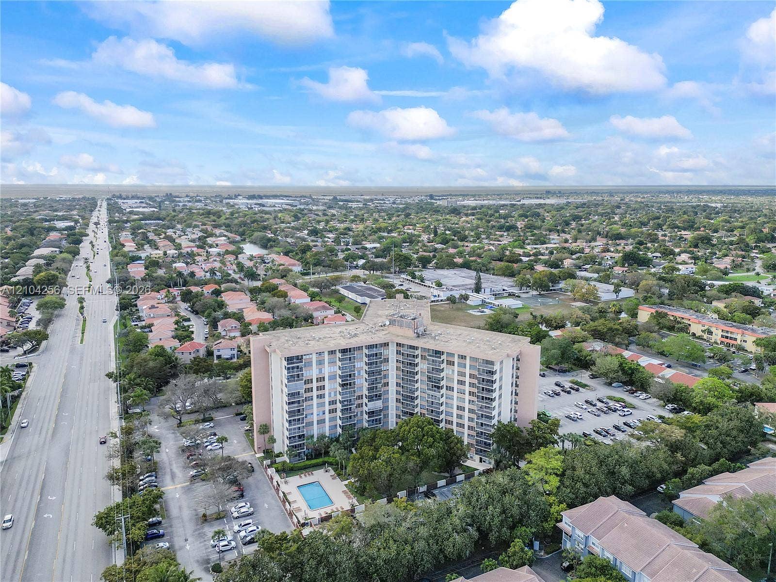 10777 W Sample Road, #907, Coral Springs, FL 33065 Facing West on Sample Rd.