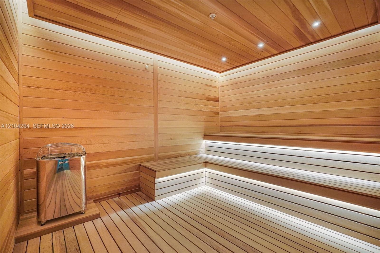 1400 Biscayne Boulevard, #1606, Miami, FL 33132 Wood-paneled sauna featuring tiered wooden benches and an integrated stainless steel heater