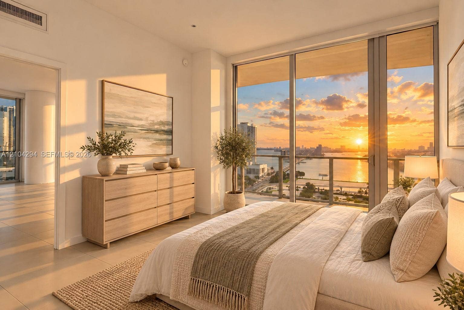 1400 Biscayne Boulevard, #1606, Miami, FL 33132 Expansive floor-to-ceiling windows, direct water scenery, light-toned tile flooring, recessed lighting, and a neutral color palette