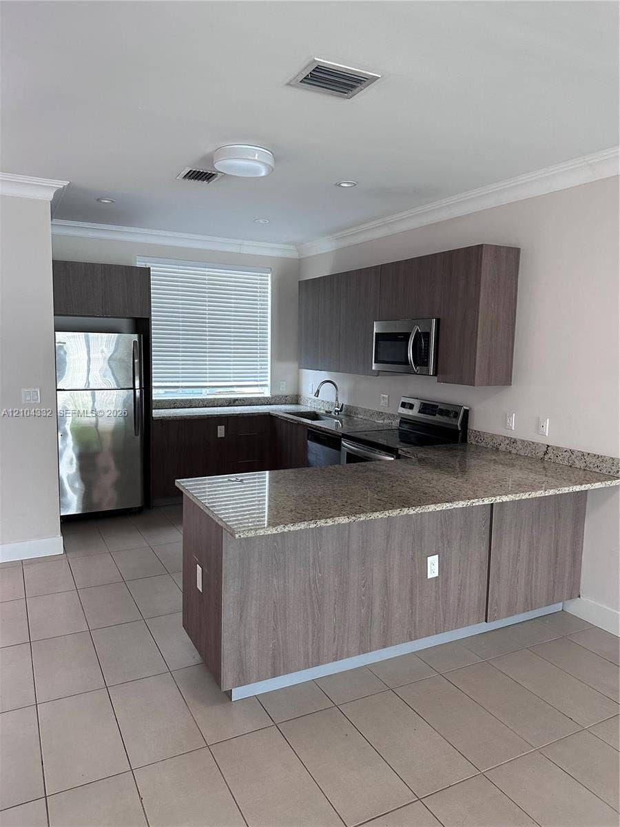 Property photo for 517 NE 121st Street, #517, North Miami, FL