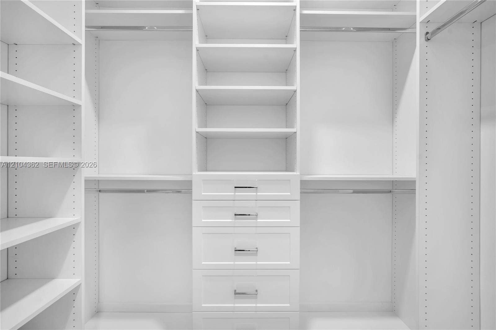 Primary room walk in closet
