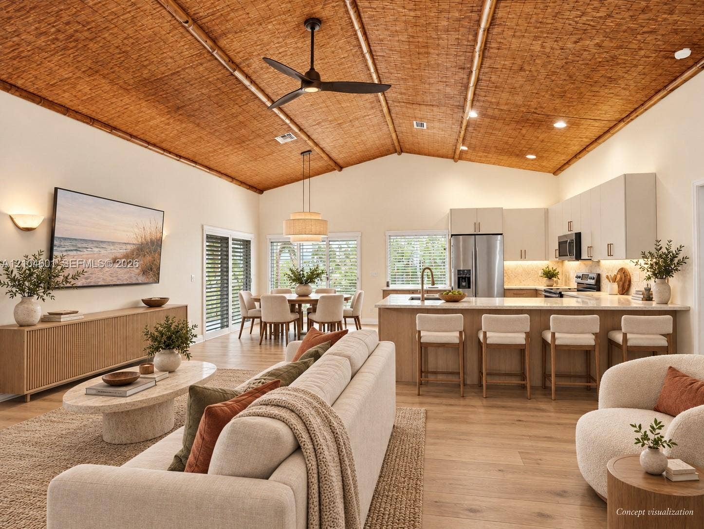 Vaulted ceiling with natural fiber inlay, wood-finish flooring, and recessed lighting