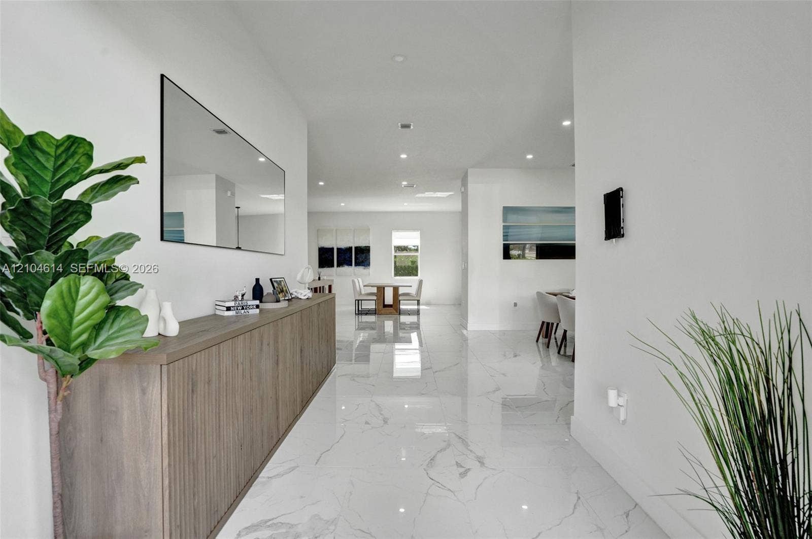 12240 SW 44th Court, Davie, FL 33330 Expansive hallway with polished tile flooring, recessed lighting