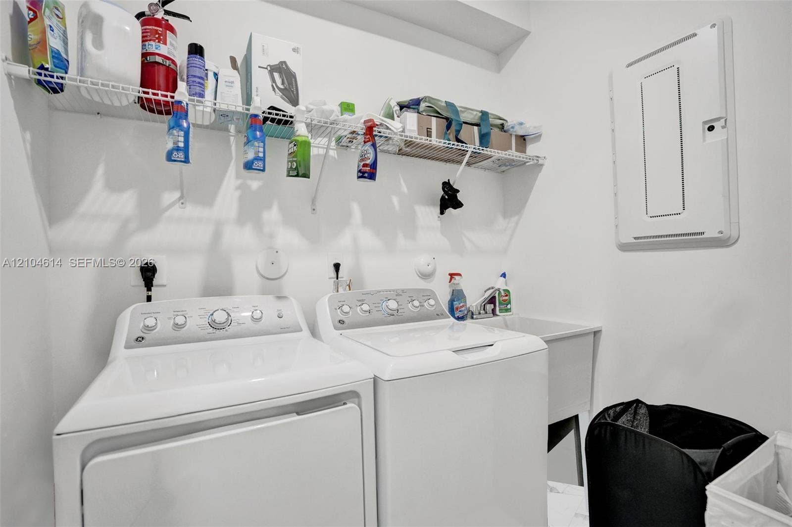 12240 SW 44th Court, Davie, FL 33330 Utility room featuring a laundry sink