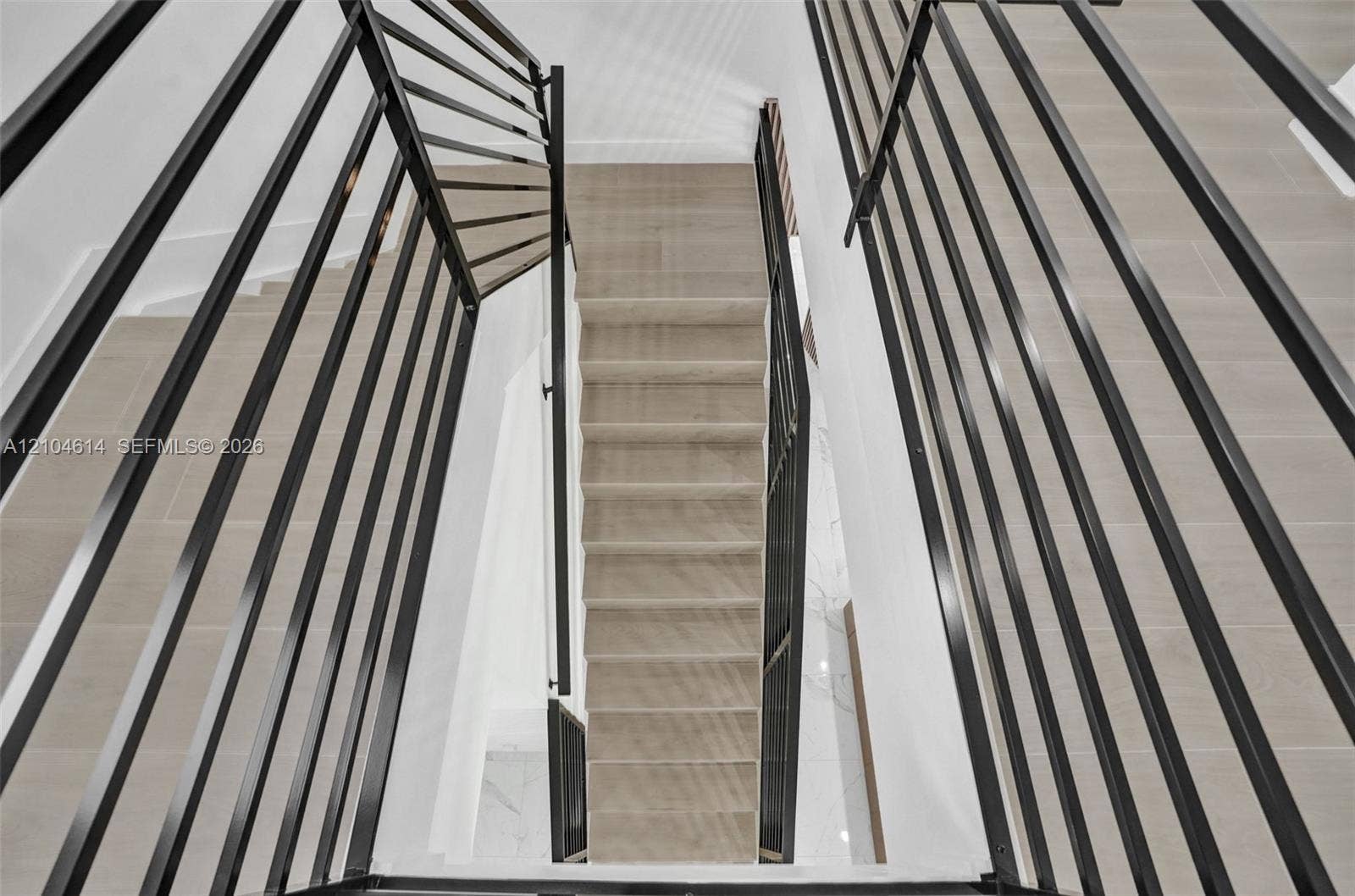 12240 SW 44th Court, Davie, FL 33330 Multi-level staircase with contemporary black metal railings