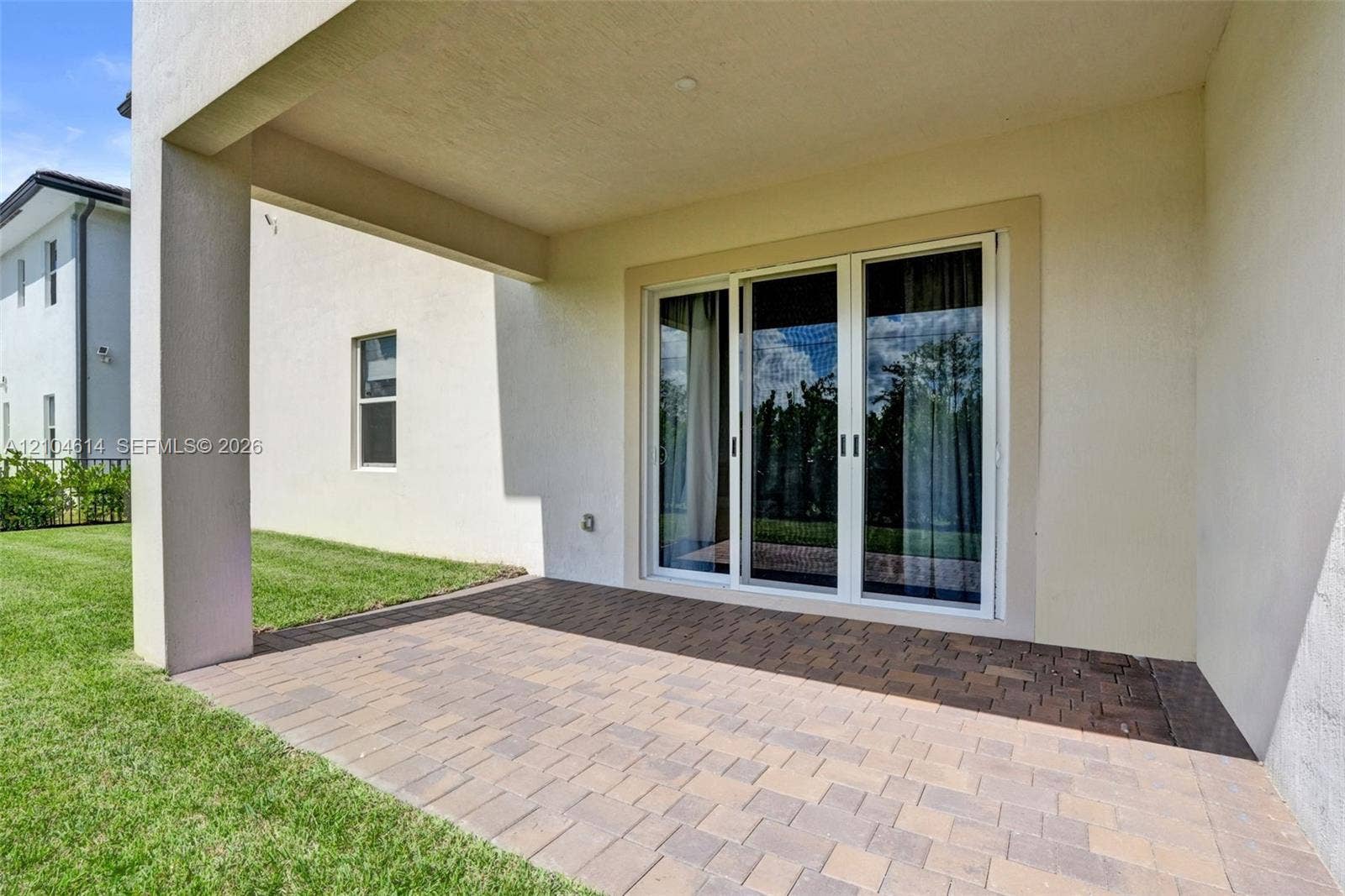 12240 SW 44th Court, Davie, FL 33330 Covered patio area featuring a brick paver surface