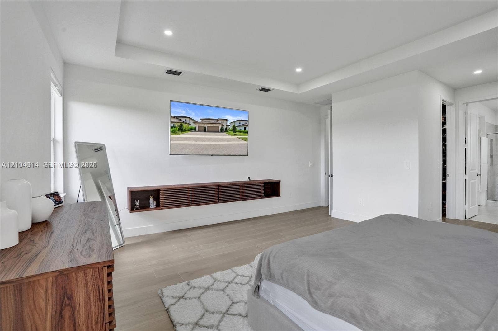 12240 SW 44th Court, Davie, FL 33330 Recessed lighting, tray ceiling, light wood look flooring