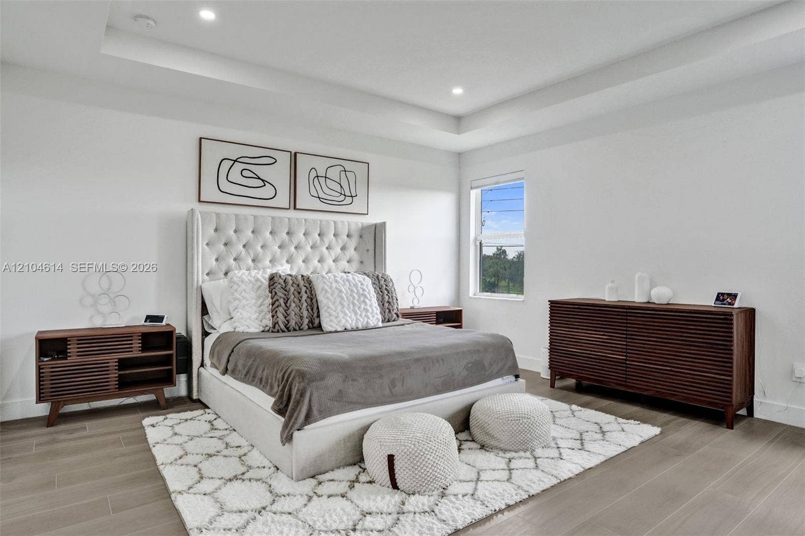 12240 SW 44th Court, Davie, FL 33330 Recessed lighting, tray ceiling, and light wood look flooring