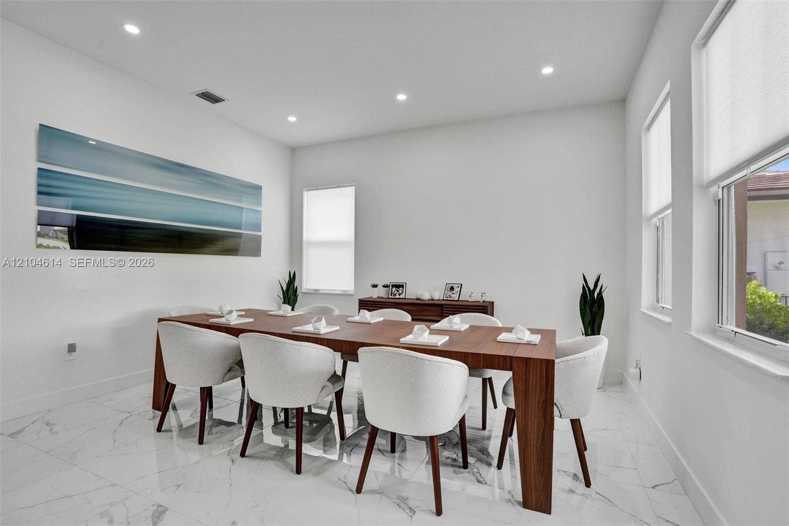 12240 SW 44th Court, Davie, FL 33330 Recessed lighting, large windows, white walls, and marble look tile flooring