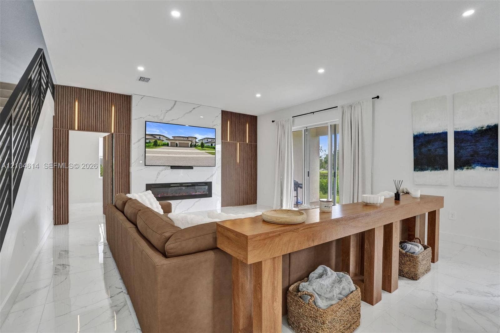 12240 SW 44th Court, Davie, FL 33330 Recessed lighting illuminates the white tile flooring