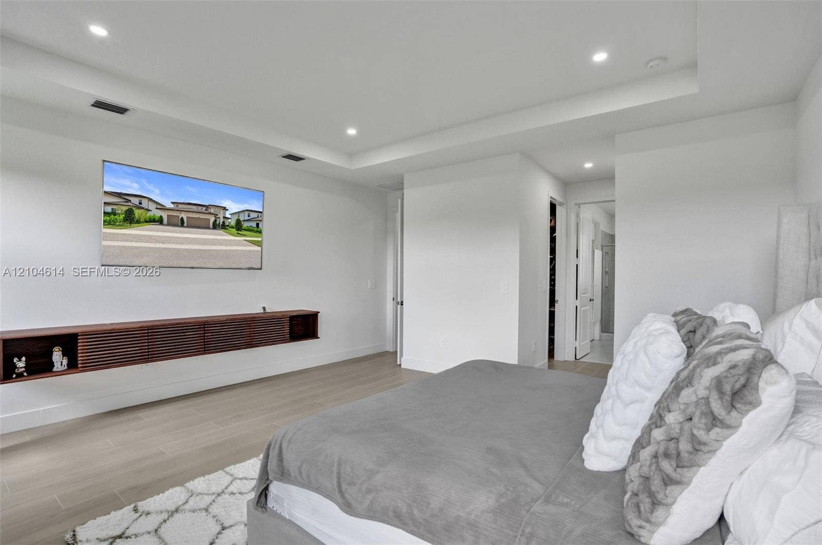 12240 SW 44th Court, Davie, FL 33330 Recessed lighting, tray ceiling, wood-look flooring