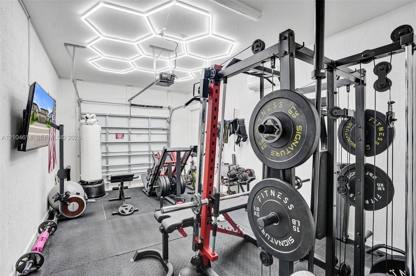 12240 SW 44th Court, Davie, FL 33330 Rubberized flooring, hexagonal ceiling lighting, perfect for gym equipment