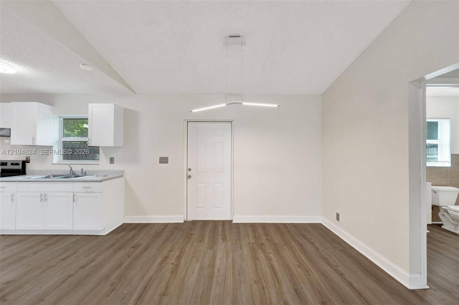 1223 NW 6th Avenue, Fort Lauderdale, FL 33311 2/1 open living and kitchen with vaulted ceiling