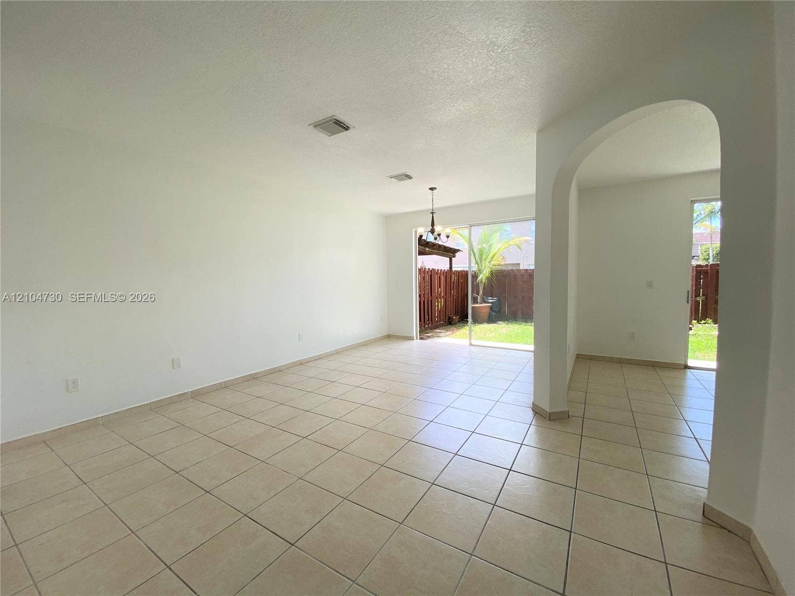 13832 SW 273rd Terrace, #13832, Homestead, Homestead, FL 33032 Living-dining space opens up to private patio area and family space also facing the enclosed patio.