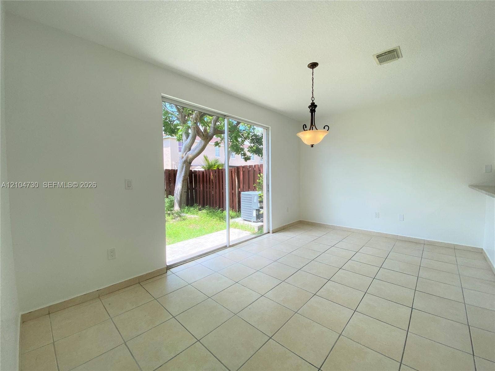 13832 SW 273rd Terrace, #13832, Homestead, Homestead, FL 33032 Spacious and bright family space with direct access to patio.