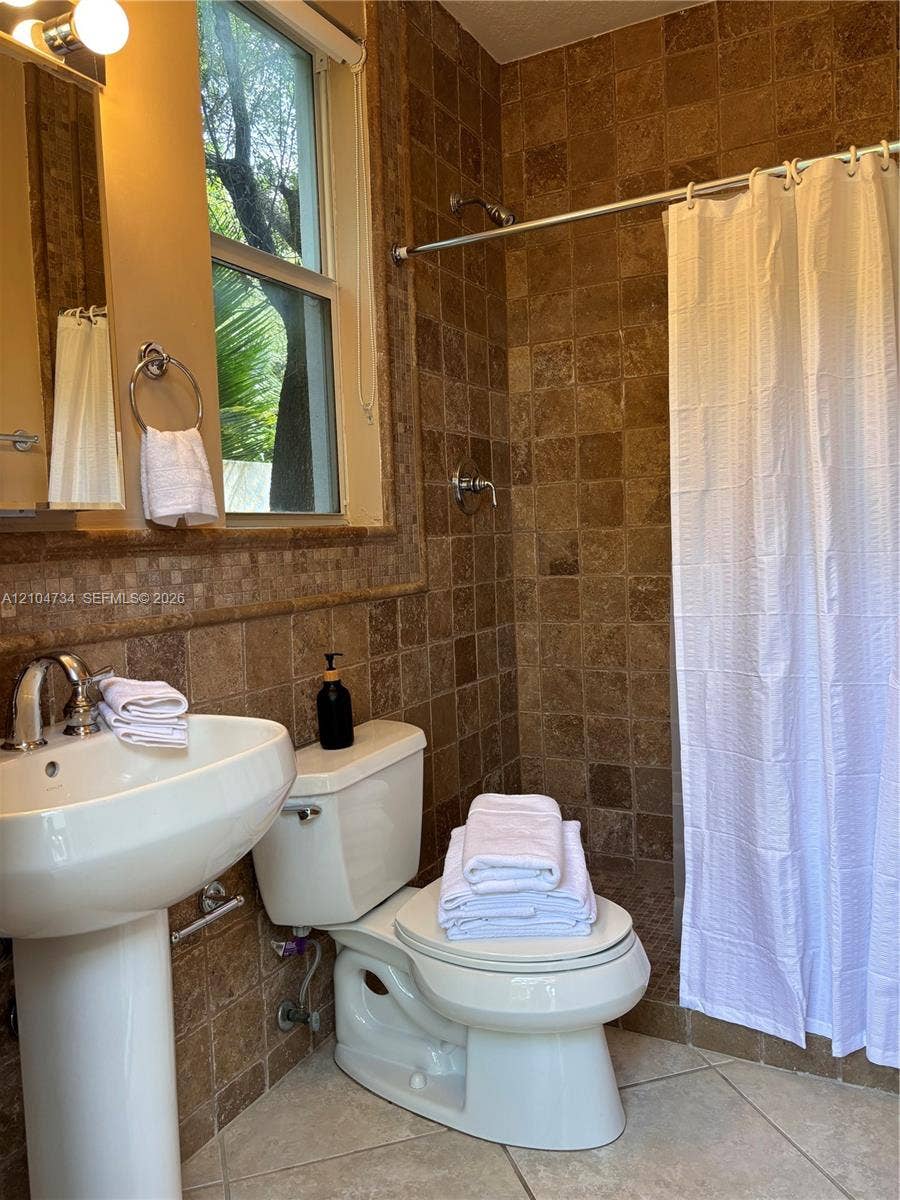 Downstair bathroom with pool access