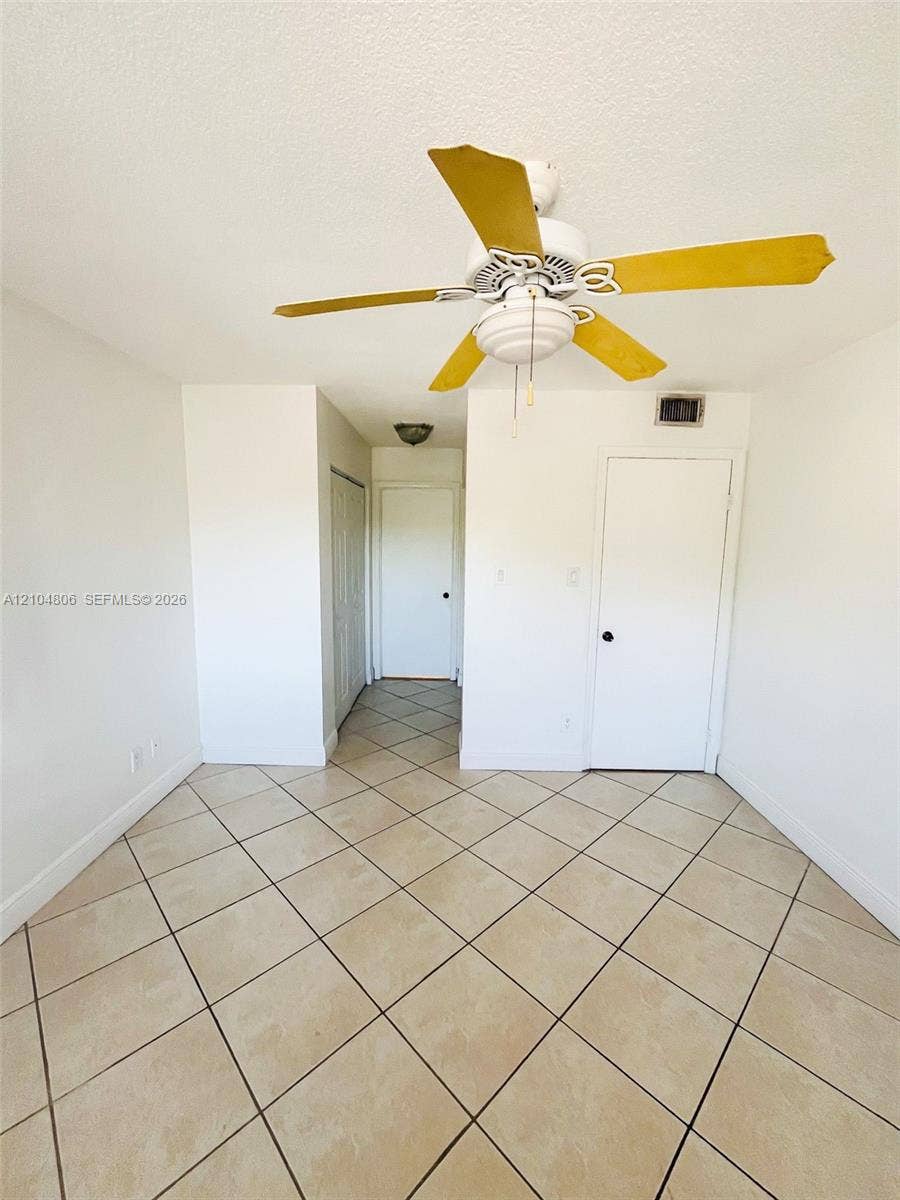 10451 SW 157th Place, #303, Miami, FL 33196 Neutral tone ceramic tile flooring