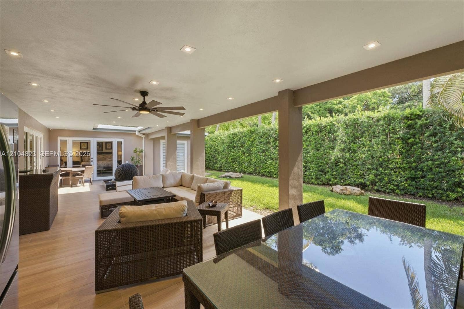 291 E Shore Drive E, Miami, FL 33133 Covered outdoor living space featuring recessed lighting and a ceiling fan