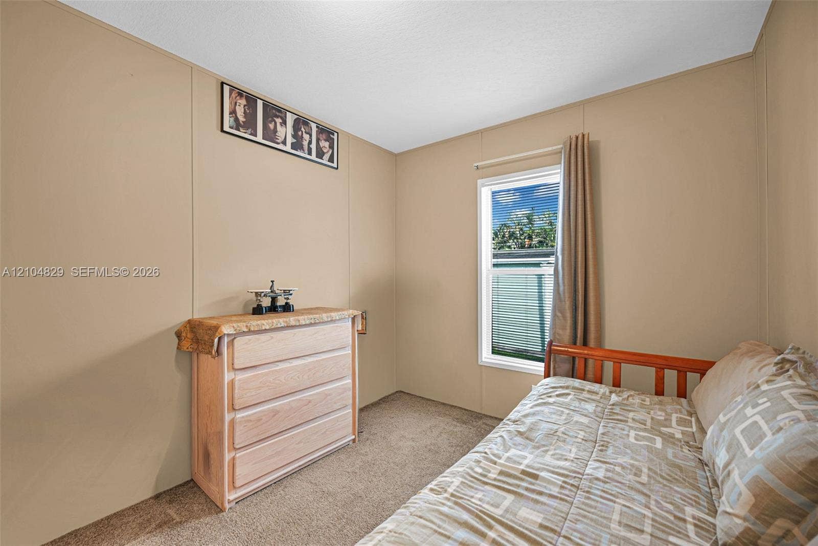 1880 SW 83rd Terrace, Davie, FL 33324 Neutral wall finish, carpeted flooring, and a single-pane window with a white frame